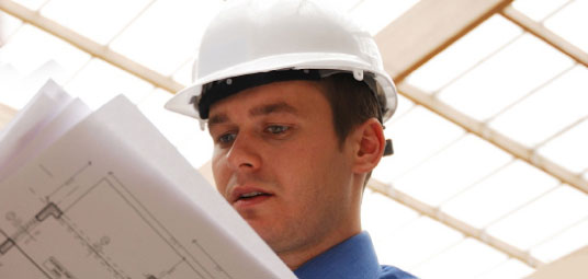 Engineer looking at drawings